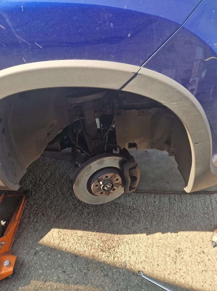 Mechanic working on a car